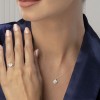 18 carat White Gold pendant with 15 diamonds and blue topaz