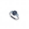 Anillo oro blanco 18 quilates 1 Topacio azul London 2 topacios suizos