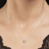 Colgante oro blanco 18 quilates circular con diamante talla brillante