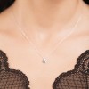 Penjoll circular en or blanc de 18 quirats 1 diamant talla brillant