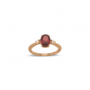 18 carat rose gold ring with oval rhodolite and 2 diamonds