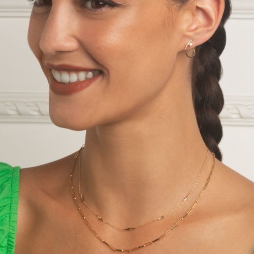 Arracades en or groc de 18 quirats amb 2 diamants talla brillant
