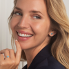 18 carat white gold earrings with a London topaz and 30 diamonds