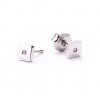Pendientes pulidos en oro blanco 18 quilates y 2 diamantes