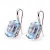 Earrings with blue topaz in 18 carat gold and hook clasp